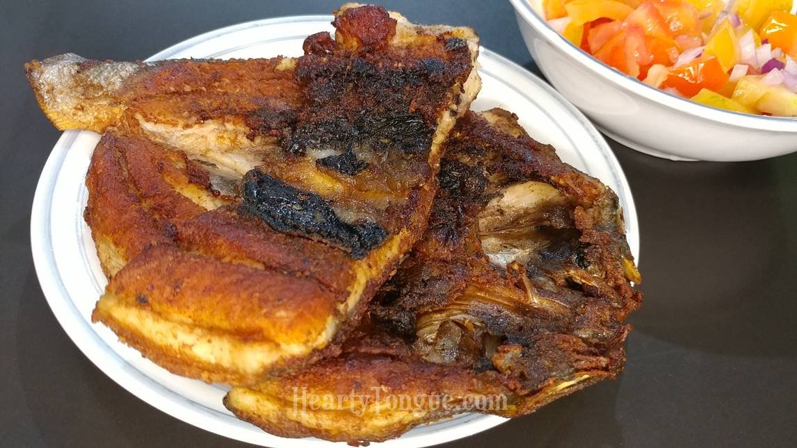 Daing na bangus with sliced tomato onion